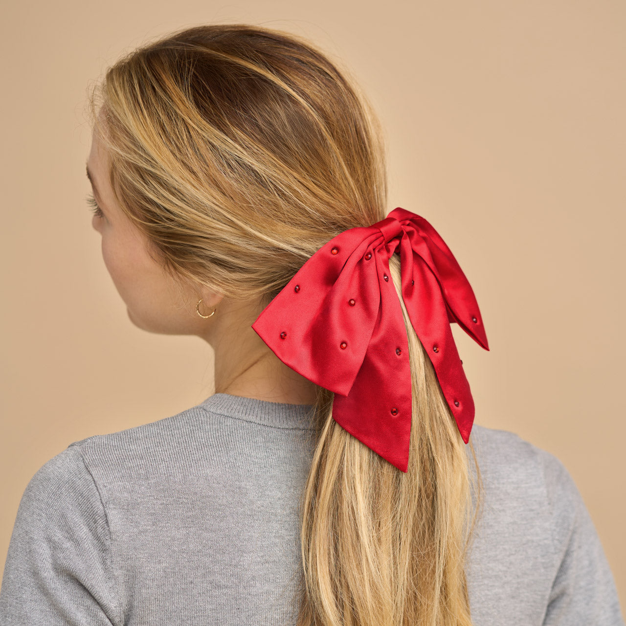 503677-Holiday-Satin_RhinestoneBowScrunchie-Red-Model-3-1280x1280px-1.jpg