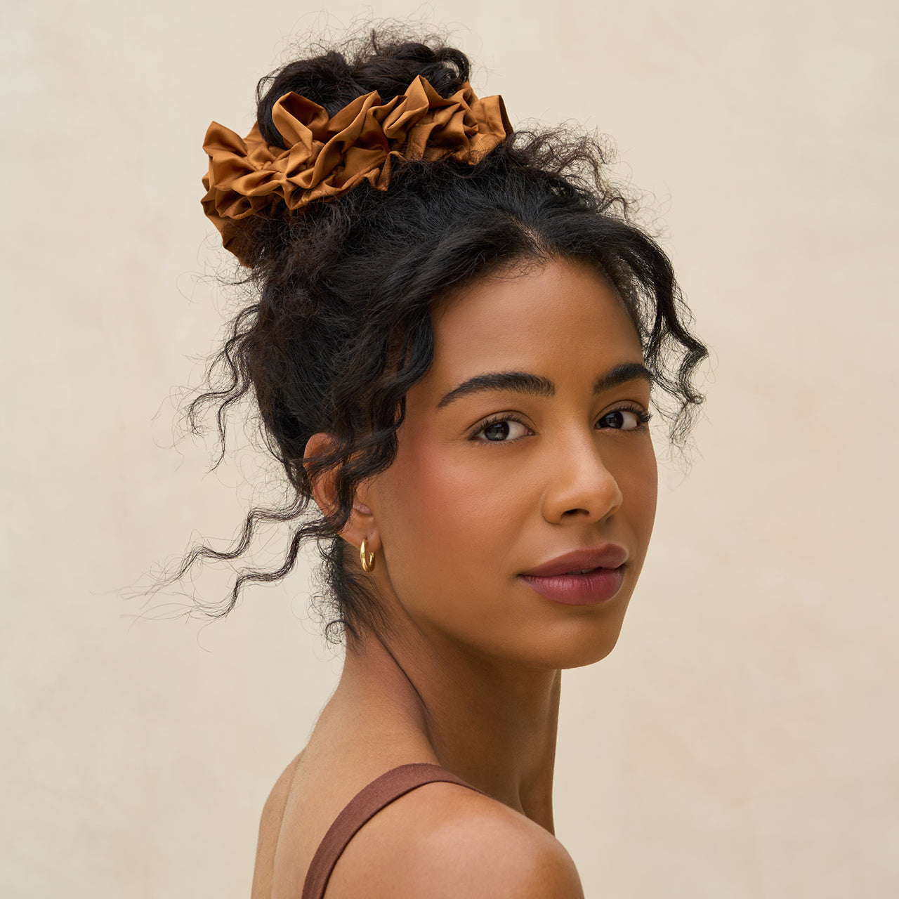 503837-RecycledFabricRuffleScrunchie-Camel-Hair-Model-2-1280x1280px_c64fb363-7fb2-48b4-a82a-d97eebcf0fdf-1.jpg