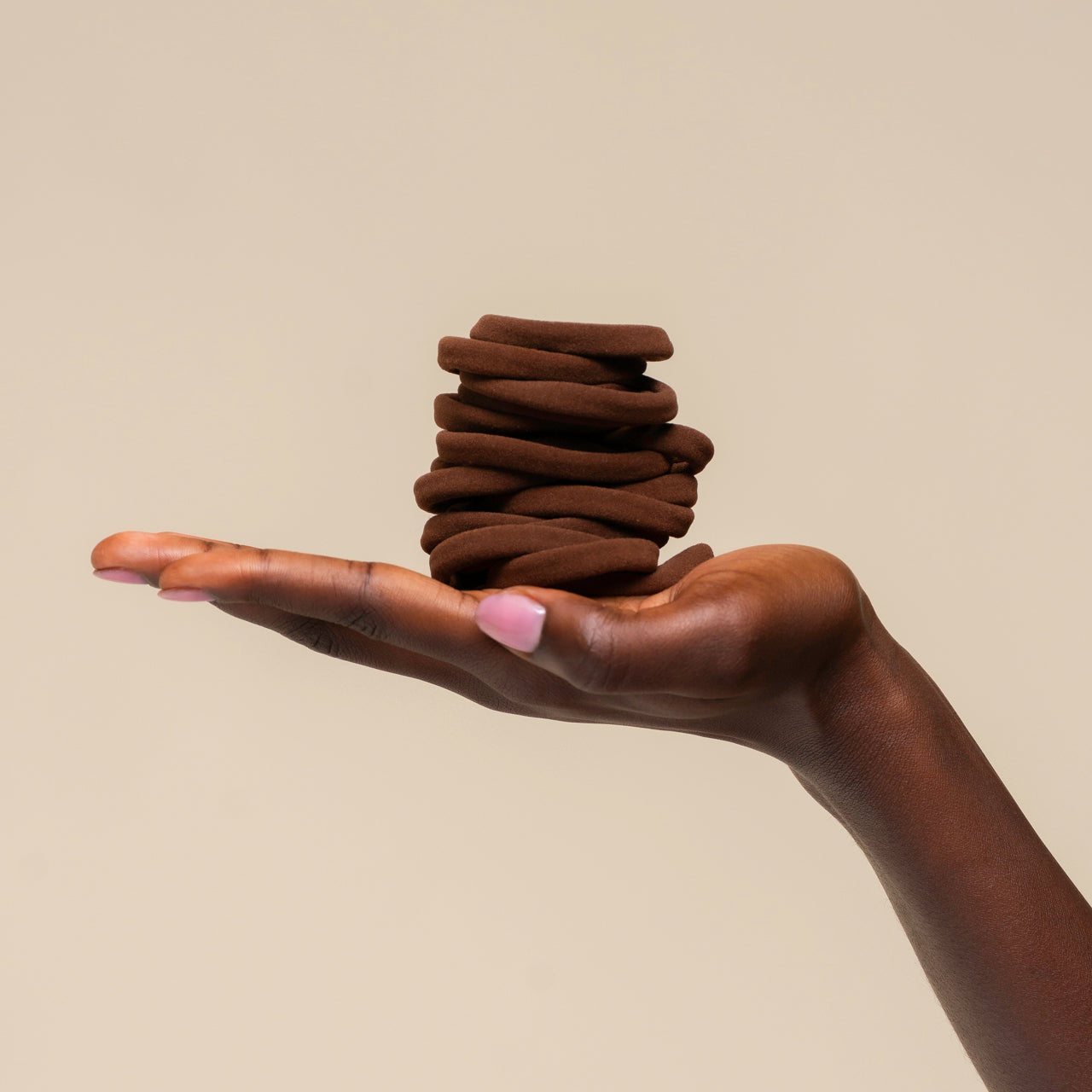 508740-RecycledFabricSeamlessHairElastics-20pc-TrendHairAccessories-Chocolate-Model-Hand-1280x1280px-1.jpg